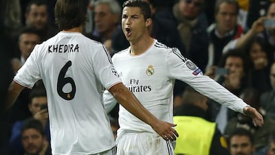 Cristiano Ronaldo celebrates scoring Real Madrid’s second goal in a 2-1 defeat of Juventus at the Bernabeu on Wednesday. Andres Kudacki / AP Photo