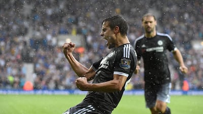 Chelsea's Cesar Azilicueta celebrates after scoring his team's third goal to go 3-1 up in their eventual 3-2 win over West Brom on Sunday. Will Oliver / EPA