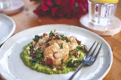 Seared prawns with pea puree and veal bacon gremolata. Courtesy Scott Price