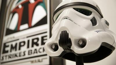 A replica of a Stormtrooper mask from the Star Wars movie series is displayed during a press preview at Sotheby’s in New York, AP