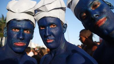 Revellers pose at a street party during pre-Carnival festivities on February 23, 2014, in Rio de Janeiro, Brazil. Carnival officially begins on February 28. Brazil is gearing up to host the 2014 Fifa World Cup. Mario Tama / Getty Images