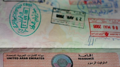 A residency visa and work permit are required for an expatriate to legally work in the UAE. Andrew Parsons / The National