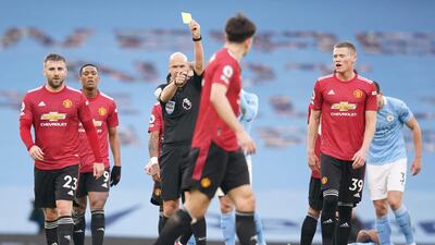 Harry Maguire - 8: Led the back four which pushed up, surprisingly, against City. Booked after 32 for a foul on Jesus as his team came under sustained pressure. Excellent. AFP