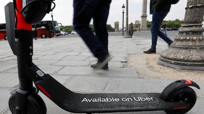 An Uber Jump electric scooter parked for rent in Paris, France. Uber is positioning itself as a transportation and logistics market-maker that can build - and then supply - new demand for everything from scooters and bicycles to freight and food delivery. Reuters