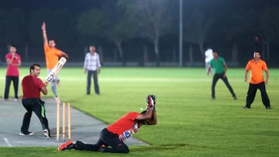 Residents of the Saadiyat Accommodation Village play cricket in the evening on the large sports field located on site. Christopher Pike / The National