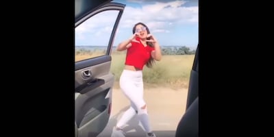 A woman performing the ‘Kiki Challenge’.