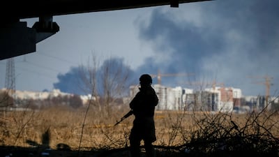 A member of the Ukrainian armed forces on patrol in Irpin. Reuters