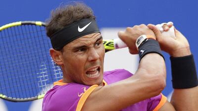 Rafael Nadal watches his shot after returning it to Rogerio Dutra Silva during the Barcelona Open on Wednesday, April 26, 2017. Manu Fernandez / AP Photo