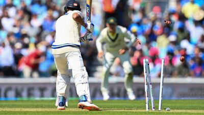 India's Shubman Gill is bowled by Australia's Scott Boland for 13. AFP