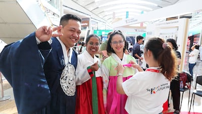 Visitors try on hanbok at the K-Culture event