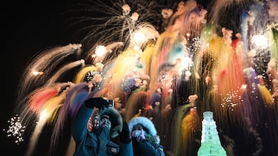 People enjoy fireworks at the opening ceremony of the Harbin China International Ice and Snow Festival in Heilongjiang province, north-eastern China. AFP