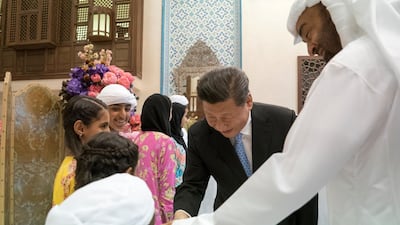 Sheikh Mohammed bin Zayed receives Mr Xi prior to a private dinner, at Sea Palace. Seen with them is Sheikh Zayed bin Mohammed bin Hamad bin Tahnoon Al Nahyan, fourth left. Courtesy Crown Prince Court - Abu Dhabi