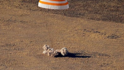 The Russian Soyuz MS-12 space capsule lands about 150km south-east of the Kazakh town of Zhezkazgan. AP Photo
