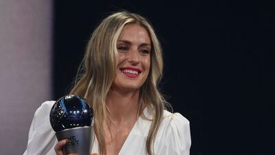 Spain and Barcelona forward Alexia Putellas poses on stage after receiving the Best Fifa Women’s Player award. AFP