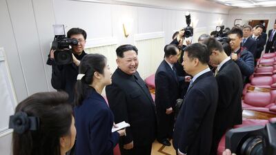 North Korean leader Kim Jong Un smiles as he paid an unofficial visit to Beijing, China. KCNA / via Reuters