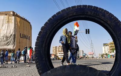 Protesters block a street in Khartoum during a demonstration against the country's military. Photo: AFP