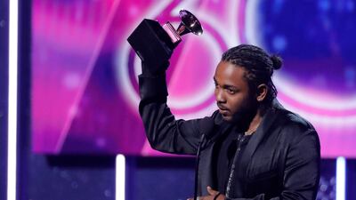 Kendrick Lamar accepts the best rap album Grammy for 'Damn.' Reuters