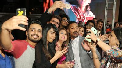 Actor Michael B Jordan with fans as he attends the Bilal premiere during day two of the 12th annual Dubai International Film Festival. Neilson Barnard / Getty Images for DIFF