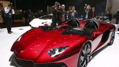 A Lamborghini Aventador, produced by Lamborghini SpA, is seen on display during the first press day of the Geneva International Motor Show in Geneva, Switzerland, on Tuesday, March 6, 2012. The 82nd Geneva International Motor Show will showcase the latest models from the auto industry's leading manufacturers at the Palexpo exhibition centre this week. Photographer: Chris Ratcliffe/Bloomberg *** Local Caption *** 998010.jpg