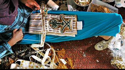 Mumtaz is held by family members overcome by her illness at a government run medical clinic November 25, 2012 on the outskirts of Sittwe, Myanmar. Mumtaz was later taken to the local hospital. Paula Bronstein / Getty Images