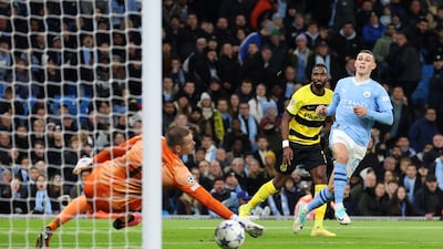 Phil Foden scores Manchester City's second goal against Young Boyt. Getty Images