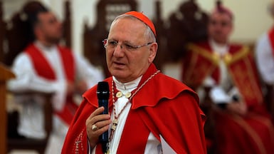 Cardinal Louis Raphael Sako addresses the faithful during the Palm Sunday service at Mar Youssif Church in Baghdad, Iraq. AP