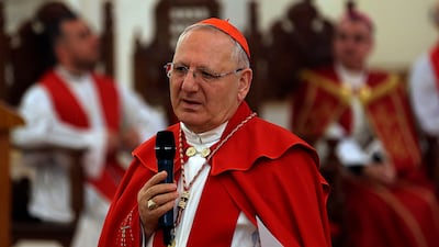 Cardinal Louis Raphael Sako addresses the faithful during the Palm Sunday service at Mar Youssif Church in Baghdad, Iraq. AP