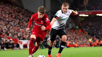 Ben Doak is challenged by Louie Sibley of Derby County. Getty