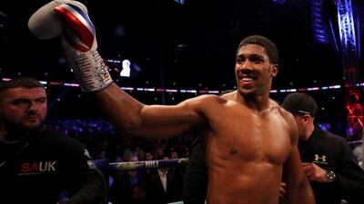 Anthony Joshua celebrates victory after the IBF, WBA Super, WBO & IBO World Heavyweight Championship title fight with Alexander Povetkin. Getty Images
