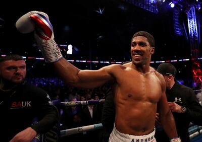 Anthony Joshua celebrates victory after the IBF, WBA Super, WBO & IBO World Heavyweight Championship title fight with Alexander Povetkin. Getty Images
