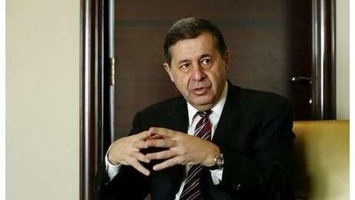 Rachid Mohamed Rachid, Egypt's minister of trade and industry, is optimistic despite the crisis. Ryan Carter / The National