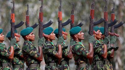 Troops and elite police have been sent to central Kandy district and imposed a curfew there on Monday to prevent clashes between majority Sinhalese Buddhists and minority Muslims after a mob set fire to a Muslim-owned shop. REUTERS/Dinuka Liyanawatte