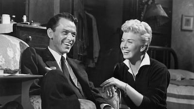 Frank Sinatra and Doris Day sharing a laugh in a scene from the film 'Young At Heart', 1954. Getty