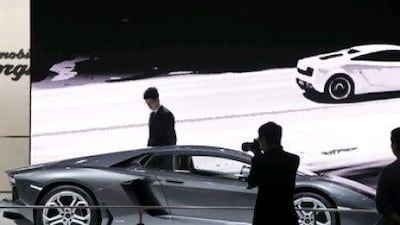 While China's nouveau riche were talking engine sizes, turbochargers and leather seats in the brightly lit exhibition halls, those in the other end of the wealth spectrum are hard-pressed survive.