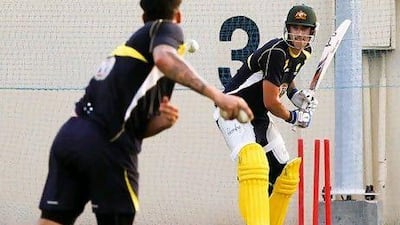 Michael Starc bats during Australia's nets practice session in Sharjah yesterday. Charles Verghese / AP Photo