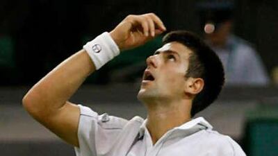 Novak Djokovic of Serbia celebrates his hard-fought victory over Olivier Rochus.