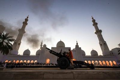 A cannon is fired at Sheikh Zayed Grand Mosque in Abu Dhabi to mark the end of the day's fast. Victor Besa / The National