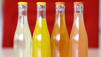 Bottles with plant-based natural colours are displayed at the offices of GNT. Seth Wenig / AP Photo