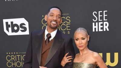 Will Smith in Dolce & Gabbana and Jada Pinkett Smith in Maison Rabih Kayrouz. AFP