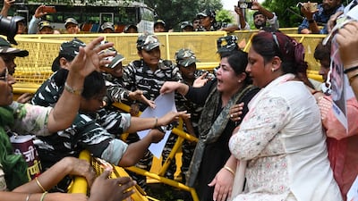 All India Mahila Congress members confront police in New Delhi during a protest over sexual violence against women in India's north-eastern state of Manipur. AFP