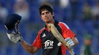 England captain Alastair Cook celebrates reaching his century in Abu Dhabi yesterday.