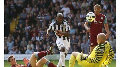 Youssouf Mulumbu, centre, scores West Brom's winning goal at the Hawthorns. Michael Steele / Getty Images