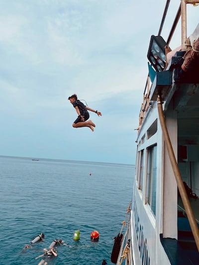 The older children enjoy diving off the Red Barron. Photo: Christine Harding