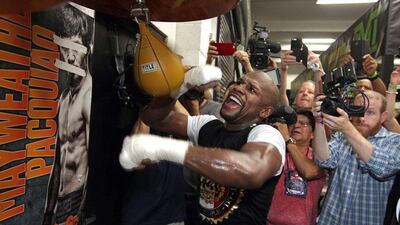 Floyd Mayweather Jr hits a speed bag on Tuesday at his Mayweather Boxing Club in Las Vegas ahead of his May 2 fight against Manny Pacquiao. John Gurzinski / AFP