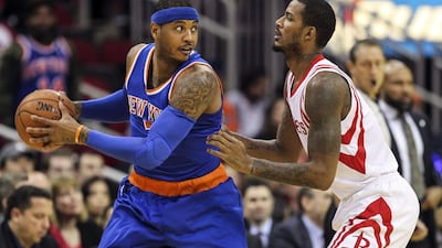 New York Knicks forward Carmelo Anthony, left, and Houston Rockets forward Trevor Ariza. Troy Taormina / USA Today