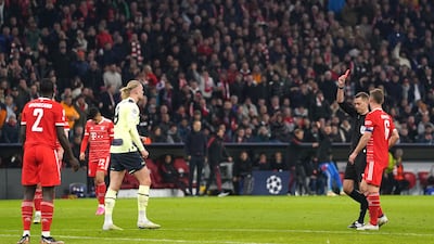 Referee Clement Turpin sends off Bayern Munich's Dayot Upamecano before VAR overturned the decision for an offside. PA