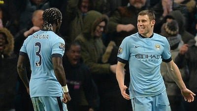 Manchester City's James Milner celebrates his winning goal on Sunday in an FA Cup third round victory over Sheffield Wednesday. Peter Powell / EPA / January 4, 2015