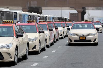 RTA taxis line up to take customers in Dubai. Pawan Singh / The National