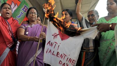 Indian women members of right-wing Bharatiya Janatha Party (BJP) set fire to an effigy representing Valentine's day during a protest to denounce Valentine's Day in Hyderabad on February 14, 2012. The BJP and right-wing hindu groups strongly oppose Valenti???