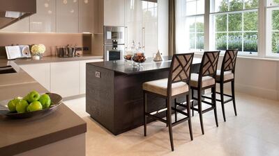 The Burlington kitchen/breakfast room. Some of the homes will have kitchen and breakfast rooms designed by Robert Timmons with Marrion Cohiba granite worktops, and a central island made from rough-cut, fumed oak. Courtesy Redrow Homes